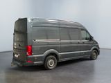 an image of a grey van parked in a room