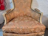 a chair that is sitting next to a fire hydrant
