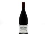 a bottle of wine that is sitting on a table