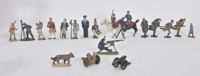 a lot of figurines that are on a white surface