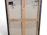 a close up of a picture of an old window with a lot of writing on it