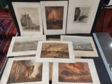 a lot of pictures on the table of a room