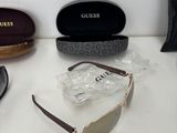 a pair of sunglasses and a pair of sunglasses on a table