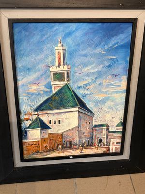 tableau représentant une église avec un clocher, dans un cadre noir