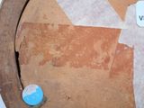 a picture of a piece of cardboard with a sticker on it
