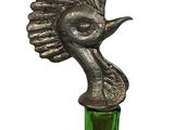 a bottle that has a bird on top of it