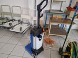 a machine that is sitting on the floor in a room