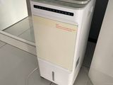 an image of a small air conditioner sitting on the floor