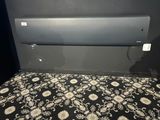 a wall mounted heater in the corner of a room