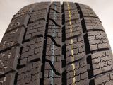 a close up of a tire on a white background with a yellow line