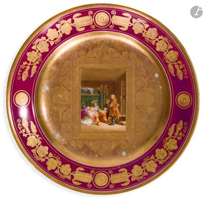une assiette avec une peinture sur une surface blanche