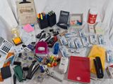 a table with a lot of office supplies on it
