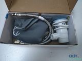 a box with a hose and a bag inside of it