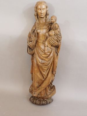 statue of a woman holding a child in her arms