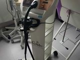 a hair dryer sitting on a cart in a room