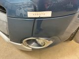 a close up of a car with a sticker on the front of it