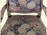 an image of a pink chair with a floral pattern on it