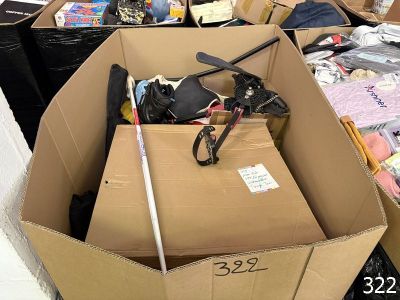 a cardboard box with a pair of scissors and a pair of scissors in it