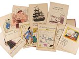 many cards with pictures of people on them on a white surface