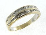 a close up of a ring with two rows of diamonds