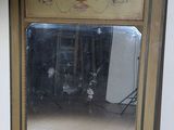 a large mirror in the middle of a room with a tile floor
