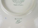 a white plate with a picture of a plane on it