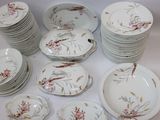a lot of plates that are sitting on a table