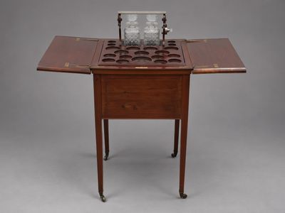 une image représentant une petite table sur laquelle est posée une horloge