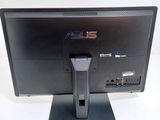 a computer monitor that is sitting on a stand