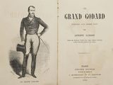an old book with a picture of a man in a suit