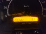 a close up of a speedometer on a car ' s dashboard