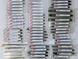 a lot of batteries that are sitting on a table