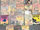 a lot of comic books on the table together