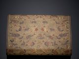 an old box with a design of birds and flowers on it