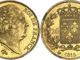 une pièce souveraine en or surmontée d'une couronne