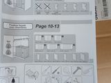 une photo d'un livre sur lequel figurent des instructions, dans une boîte