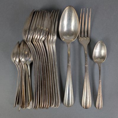 a lot of silver spoons and spoons on the table