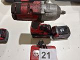 a picture of a cordless drill and other tools on a table