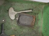 a green box with tools on top of it