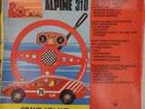 a poster of a car with a steering wheel on it