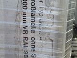 a large container of food sitting on a pallet in a warehouse