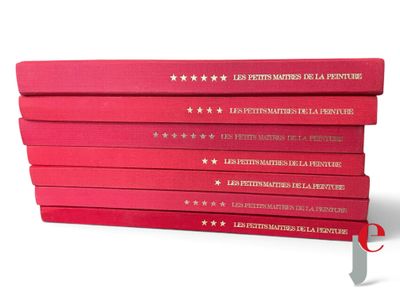 several red books stacked on top of each other on a white surface