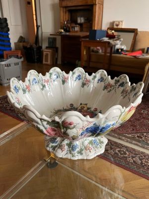 a glass table with a bowl on top of it