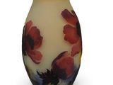 a vase with a flower design on it on a white background