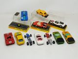a lot of toy cars that are in a display case