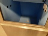 a small blue box in the middle of the floor