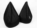 a pair of black bean bags sitting on top of each other
