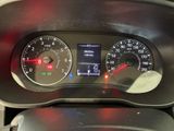 a close up of a car dashboard with a speedometer and gauges