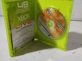a green box with a cd inside of it