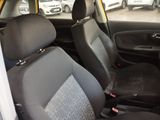 the interior of a small car with black and gray seats